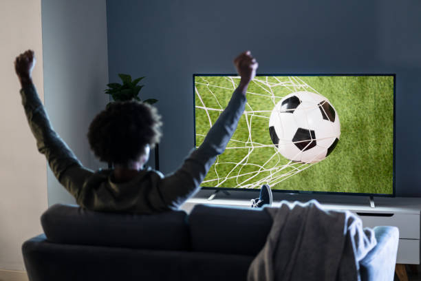 istock African Young Man Watching Football 1324367624