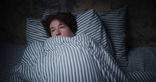 istock Mature woman is freezing in bed 1324370607