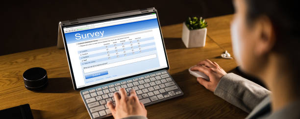 istock Woman Filling Survey Form 1324371412