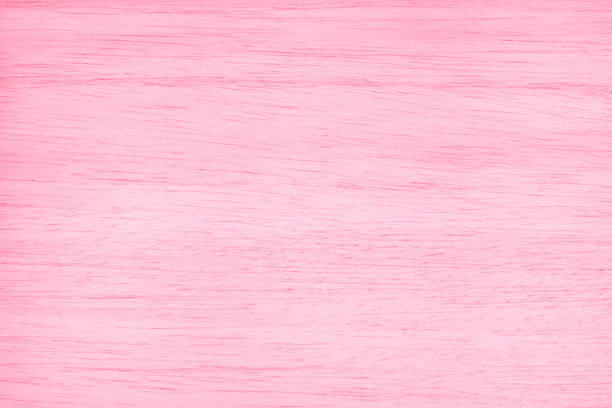 istock Pink plywood texture background, wooden surface in natural pattern for design art work. 1324374524