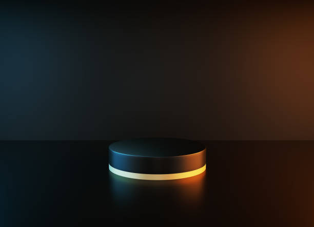istock Black Podium Illuminated By Spotlights Before Black Background 1324376977