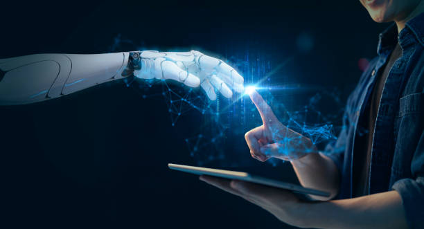 istock Human and robot future technology, futuristic abstract innovation finger pointing hand closeup using computer control robot. 1324380498