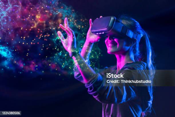 People With Vr Grasses Playing Virtual Reality Game Future Digital Technology And 3d Virtual Reality Simulation Modern Futuristic Lifestyle Stock Photo - Download Image Now