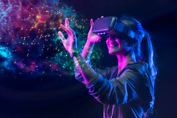 people with vr grasses playing virtual reality game. future digital technology and 3d virtual reality simulation modern futuristic lifestyle - innovation imagens e fotografias de stock