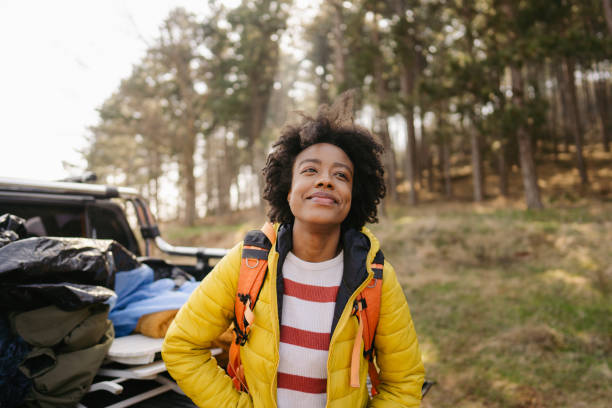 istock Young smiling woman ready to hike 1324381760