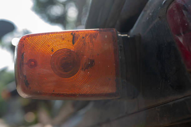 istock orange old lamp of a motorcycle with blurred background 1324383223