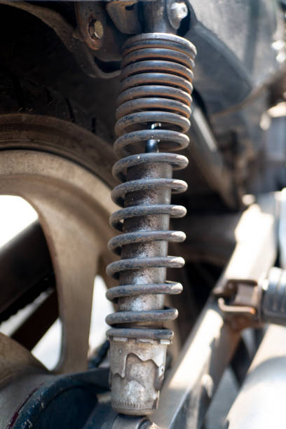 istock right side rear suspension of old motorcycle 1324383233