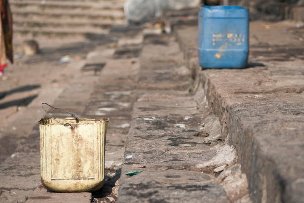 Banganga, Maharashtra / India - February 24, 2007: The view of the buckets on the steps.