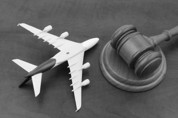istock Crashed aircraft and wooden judge gavel. 1324384942