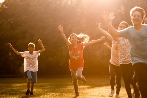 istock Happy kids running in the nature 1324385046