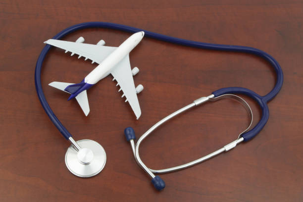 istock Airplane model and stethoscope close up. 1324385110