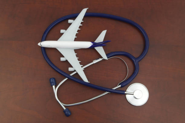istock Airplane model and stethoscope close up. 1324385291