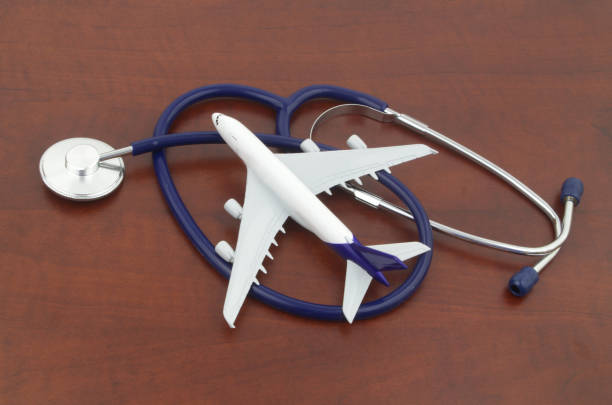 istock Airplane model and stethoscope close up. 1324385339