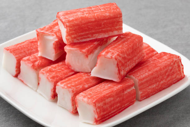 istock Plate with whole and half Surimi sticks close up 1324386399