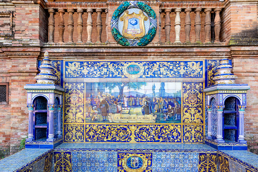 Seville, SPAIN - January 07 2020: Bench of the Vizcaya province. Plaza de Espana (Square of Spain) designed by Anibal Gonzalez for Ibero-American Exposition of 1929.