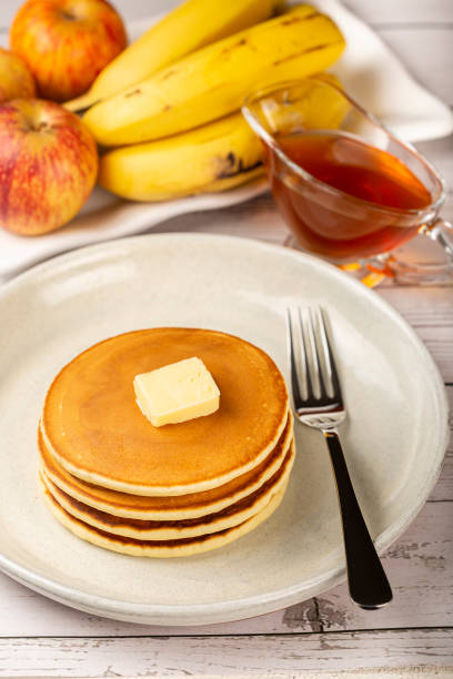 istock Delicious pancakes with butter and honey. 1324390280