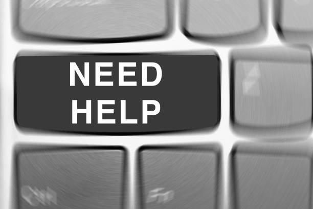 istock Close up of need help key. a computer keyboard with Radial blur effect applied to the image. 1324390990