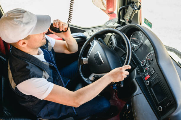 istock Professional truck driver CB talking 1324392267