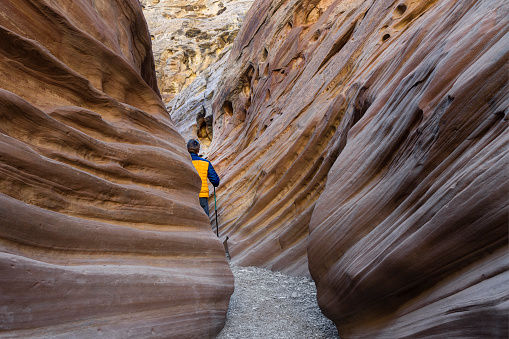 Man exploring Little Wild Horse Canyon, Utah, USA