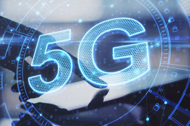 istock Hand using tablet with 5G network digital hologram and internet of things background. High speed internet concept. Double exposure. 1324400353