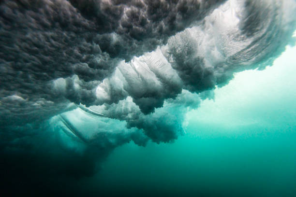 istock Underwater scene of crashing ocean wave 1324401244