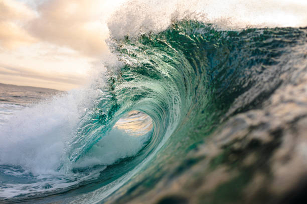 istock Majestic green wave breaking into deep ocean 1324402742