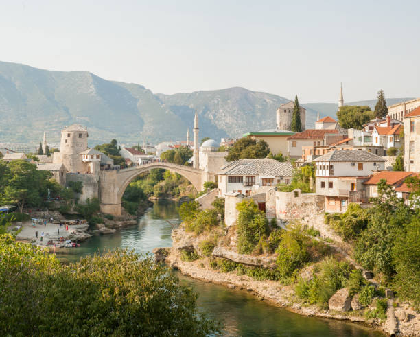 Old town of Mostar, Bosnia and Herzegovina. Old bridge above beautiful emerald river Neretva Old town of Mostar, Bosnia and Herzegovina. Old bridge above beautiful emerald river Neretva. High quality photo mostar stock pictures, royalty-free photos & images