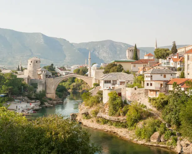 Old town of Mostar, Bosnia and Herzegovina. Old bridge above beautiful emerald river Neretva. High quality photo