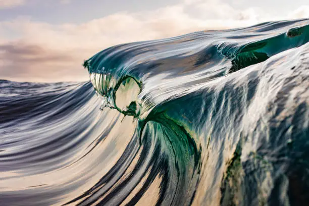 Photo of Motion Blur of smooth cresting green wave