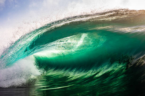 istock Majestic green breaking wave in bright morning light 1324404101
