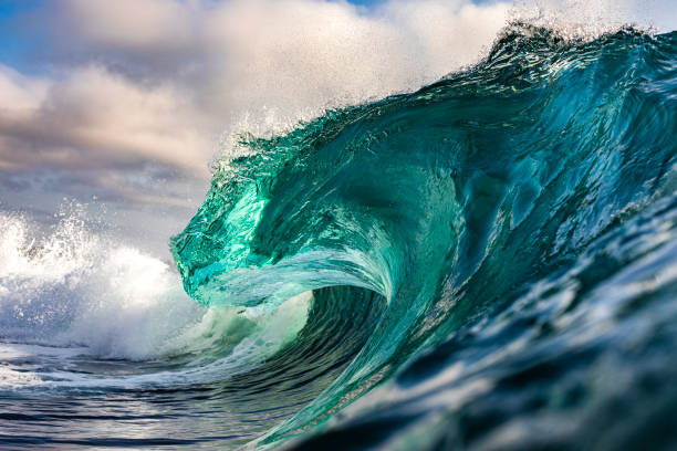 istock Powerful ocean wave crashing out at sea 1324404772