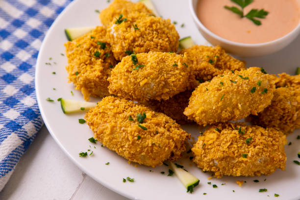 istock Fish croquettes with pink sauce. 1324406090