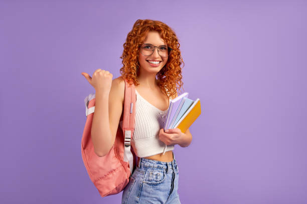 istock Redhead girl on background 1324413396