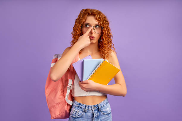 istock Redhead girl on background 1324413433