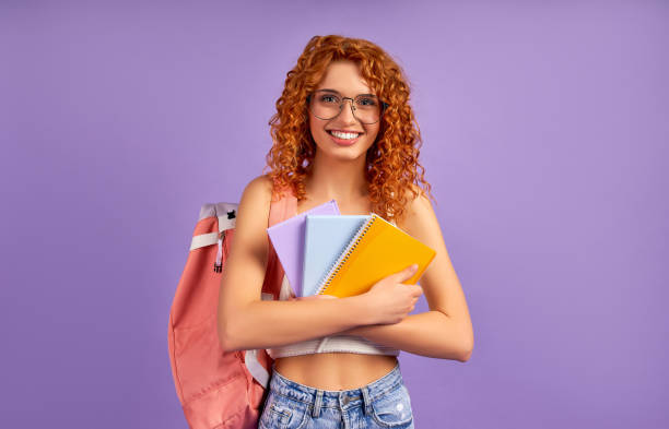 istock Redhead girl on background 1324413443