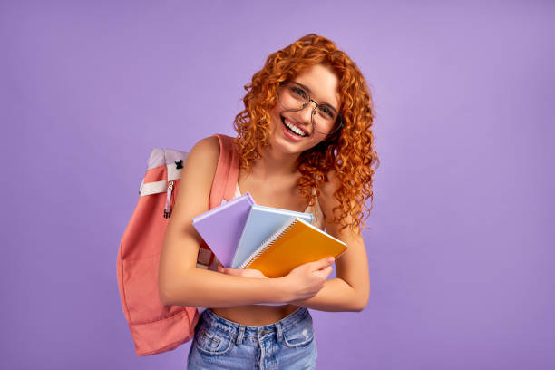 istock Redhead girl on background 1324413495
