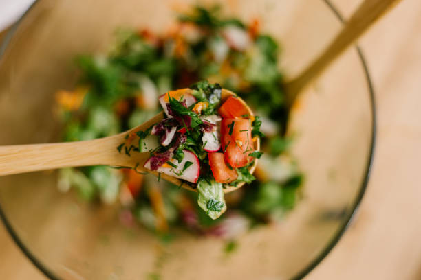 Healthy salad in glass bowl