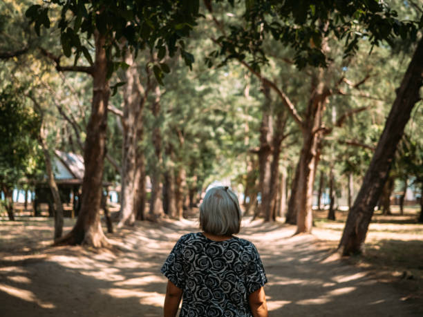 istock Senior women having fun in the park. 1324417725