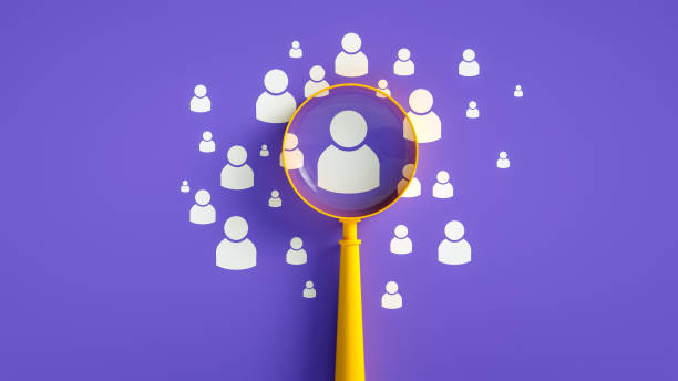 human resources concept, magnifier and people icon on purple background, business leadership concept - recruitment imagens e fotografias de stock