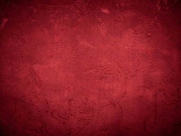 istock Beautiful decorative Venetian plaster in red. Plastered wall texture for backgrounds 1324419790