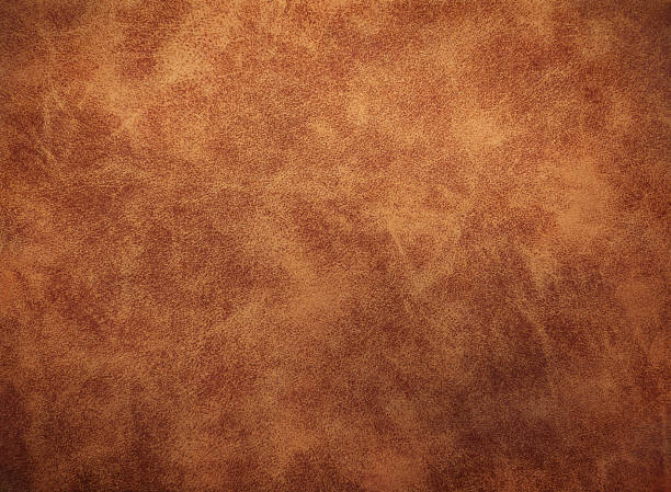 istock Dark orange, brown eco-leather, leather with a pattern of lines for design or red abstract background. You can use wallpaper. 1324420491