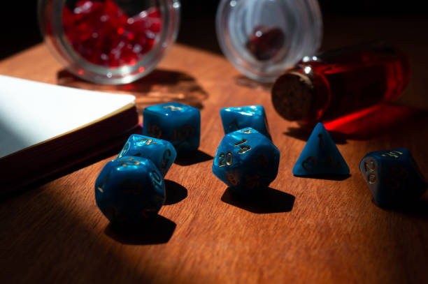 istock Close-up image of blue marbled role-playing gaming dice 1324421733