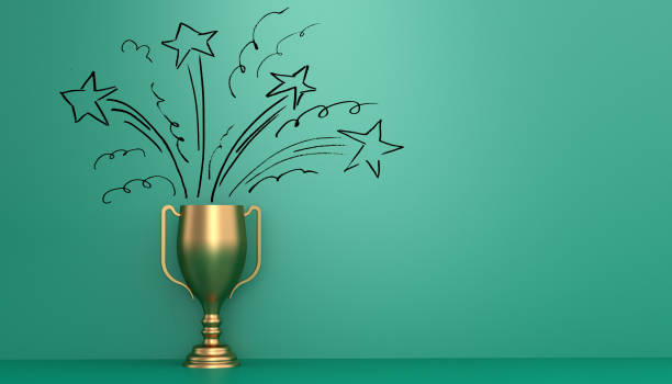 The winner Golden trophy in front of green wall with stars drawn on it to represent the winning joy winning stock pictures, royalty-free photos & images