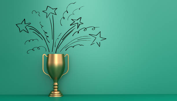 The winner Golden trophy in front of green wall with stars drawn on it to represent the winning joy win prizes stock pictures, royalty-free photos & images