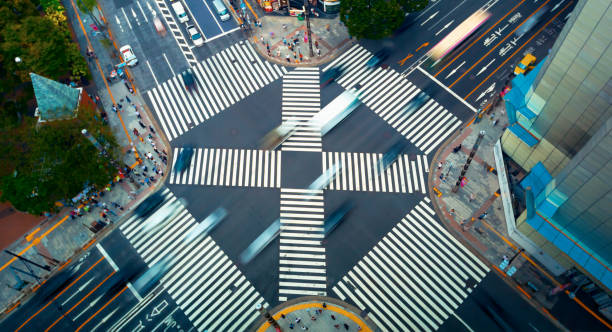 istock Traffic and people cross a busy intersection in Ginza 1324440722