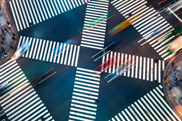 istock Traffic and people cross a busy intersection in Ginza 1324440780