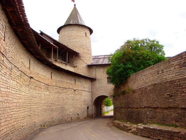 Old Russian Fortress (Kremlin) Corridor and gate inside the old fortress in Pskov, Russia pskov russia stock pictures, royalty-free photos & images