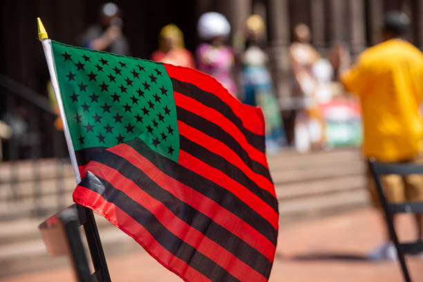 Black Liberation African American Flag. Pan-African flag. UNIA, Red-Black-Green flag. Copy space for your text parade photos stock pictures, royalty-free photos & images