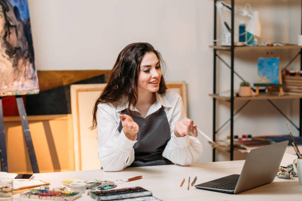 istock online master class female artist art school 1324447225