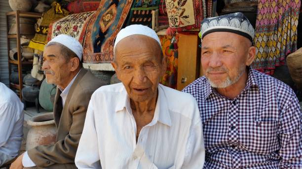 Three elderly Uyghur men in Kashgar old town.